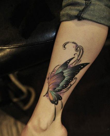 点击大图看下一张：美丽花蝴蝶小腿纹身