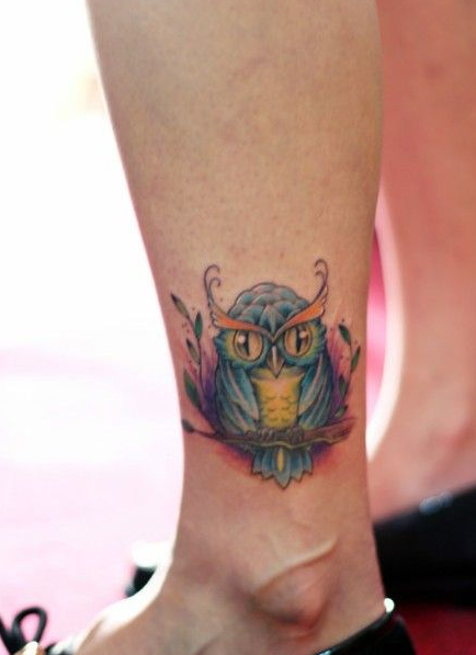 点击大图看下一张：可爱猫头鹰脚踝纹身