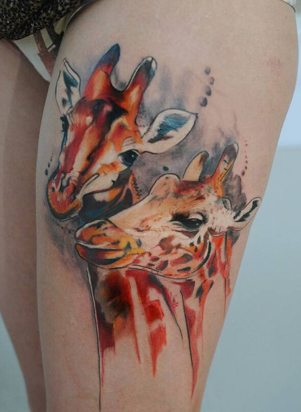 点击大图看下一张：腿部长颈鹿头纹身图案