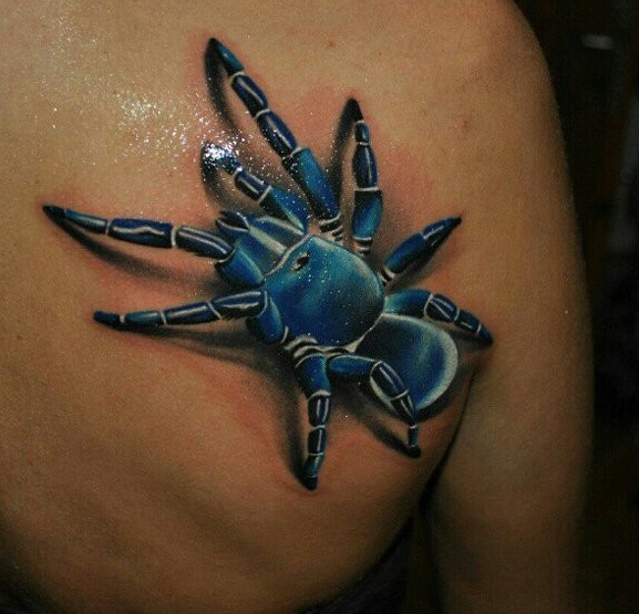 点击大图看下一张：后背蓝色3D蜘蛛纹身