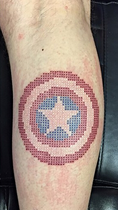 点击大图看下一张:美国队长盾牌十字绣纹身