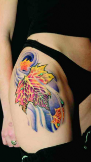 漂亮的彩绘枫叶腿部纹身图案
