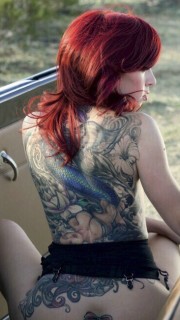 欧美美女满背花和美人鱼纹身
