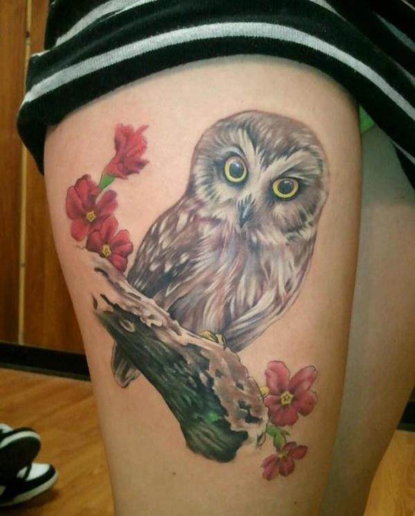 点击大图看下一张：女性大腿猫头鹰纹身图案