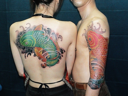 点击大图看下一张：情侣鲤鱼纹身图案