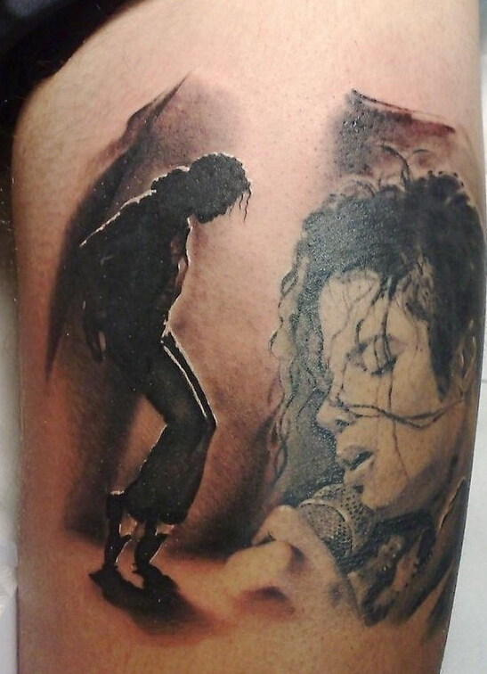 点击大图看下一张：大腿上迈克杰克逊头像纹身
