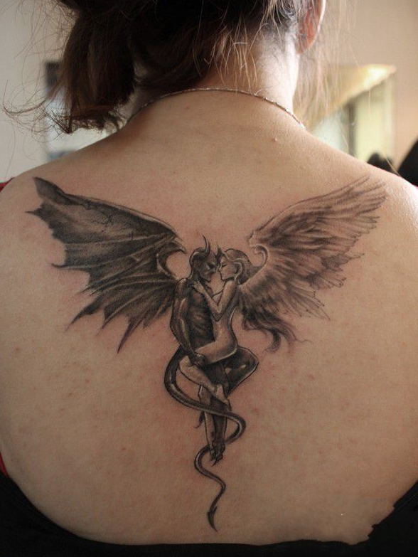 点击大图看下一张：天使与魔鬼背部纹身