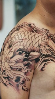 胳膊点刺中国传统墨色鲤鱼纹身