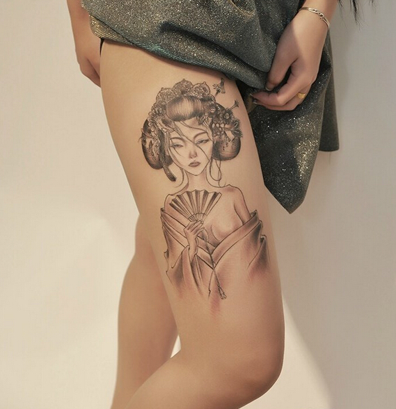 点击大图看下一张：美女性感大腿艺妓纹身