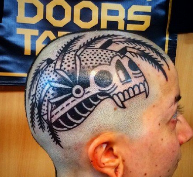点击大图看下一张：头部甲壳虫刺青纹身图案