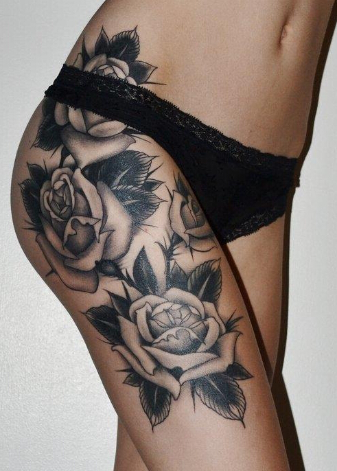 点击大图看下一张：腿部黑灰玫瑰花纹身图案