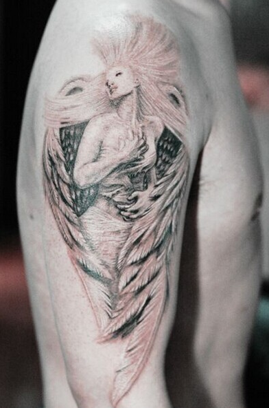 点击大图看下一张：手臂帅气的天使纹身