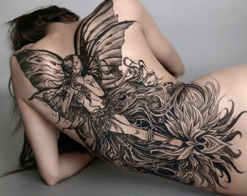 点击大图看下一张：美女满背蝴蝶精灵纹身图案