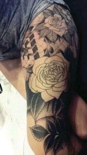大腿上霸气的玫瑰纹身图案