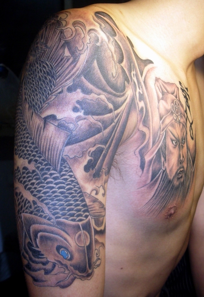 点击大图看下一张：半甲鲤鱼关公纹身图案