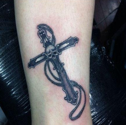 点击大图看下一张：小腿十字架骷髅头刺青