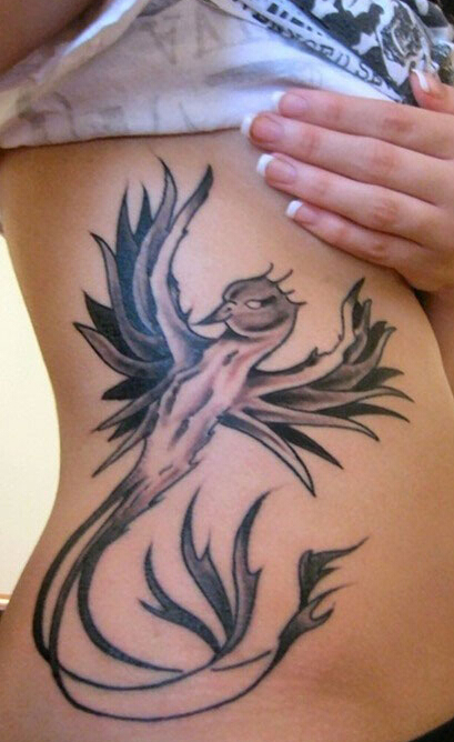 点击大图看下一张:美女腰部幼儿凤凰纹身