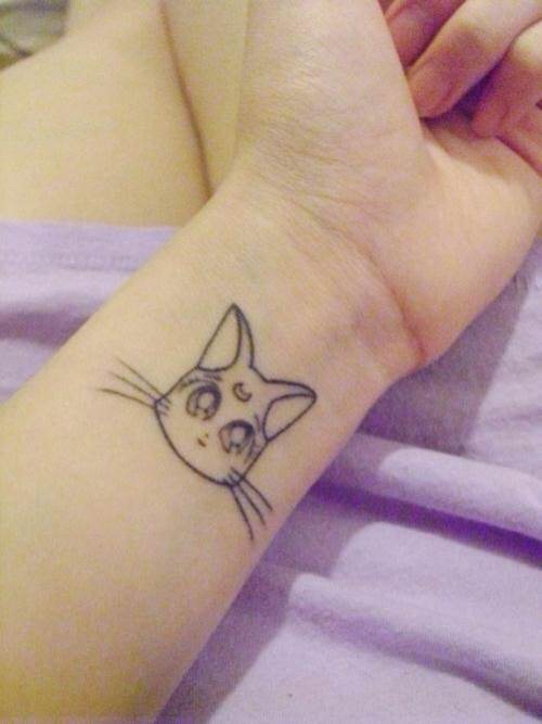 点击大图看下一张:手腕猫咪纹身图案