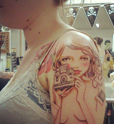 点击大图看下一张：手臂奥黛丽川崎风格摄影女孩纹身