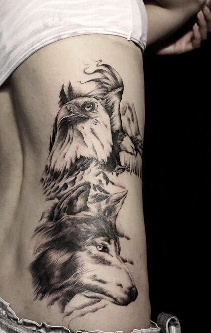 点击大图看下一张：美女黑灰老鹰和狼头纹身