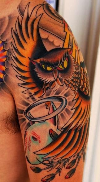 点击大图看下一张：神秘的猫头鹰手臂纹身图案大全