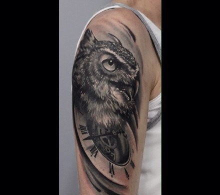 点击大图看下一张：神秘的猫头鹰手臂纹身图案大全