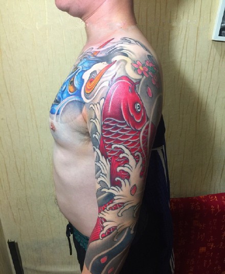 点击大图看下一张:大气漂亮的般若半甲纹身大全