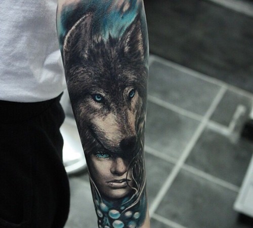 点击大图看下一张：男士钟爱的帅气的狼头纹身