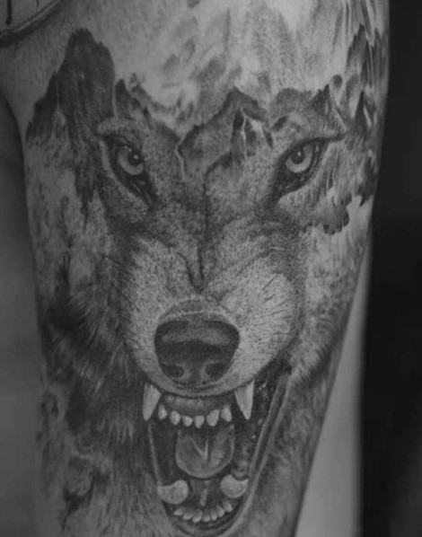 点击大图看下一张：男士钟爱的帅气的狼头纹身