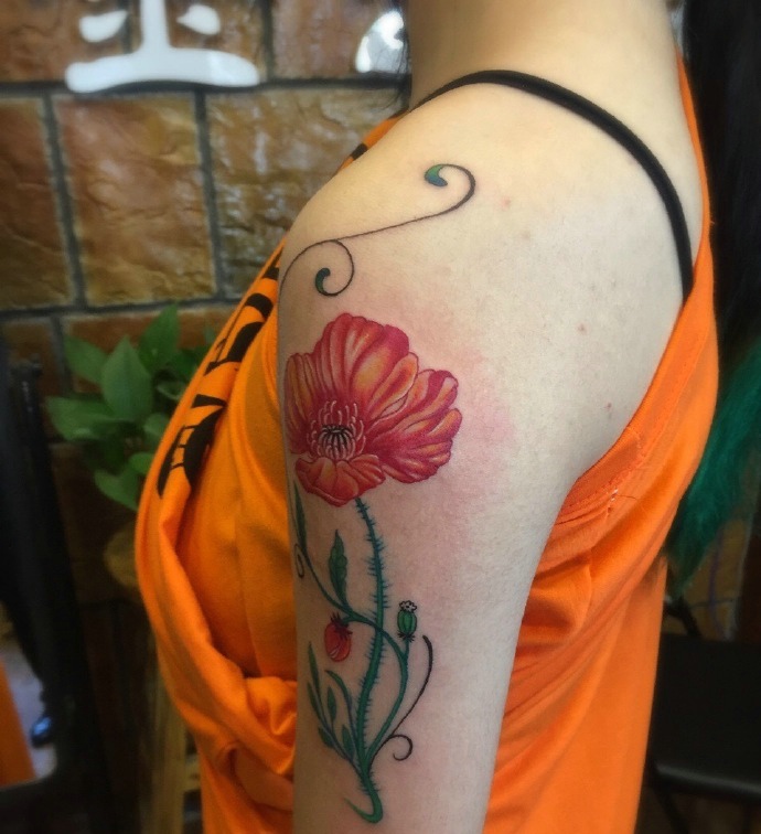 点击大图看下一张：漂亮精致的花臂花朵纹身刺青