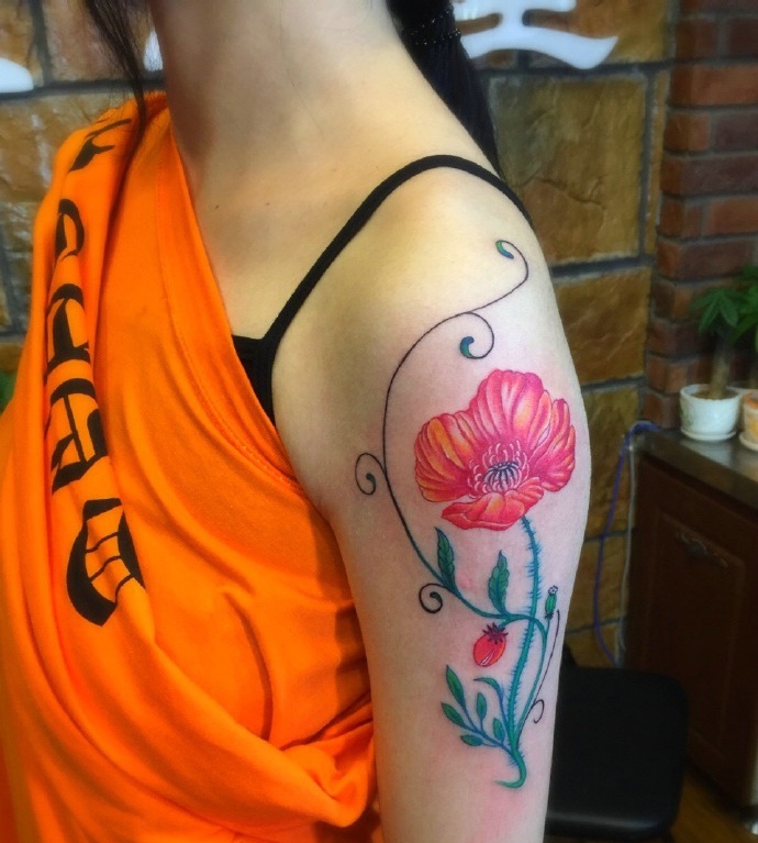点击大图看下一张：漂亮精致的花臂花朵纹身刺青