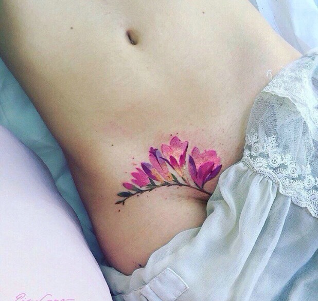 点击大图看下一张：适合剖腹产辣妈的遮盖疤痕的纹身刺青