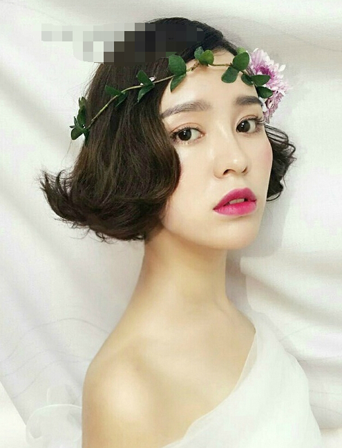 点击大图看下一张:5款短发新娘娇俏妩媚的造型