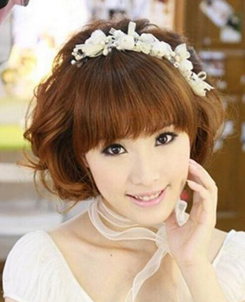 点击大图看下一张:5款短发新娘娇俏妩媚的造型
