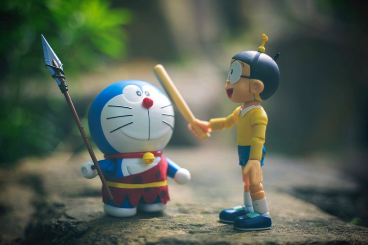 点击大图看下一张：机器猫与野比大雄