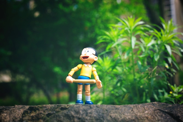 点击大图看下一张：机器猫与野比大雄