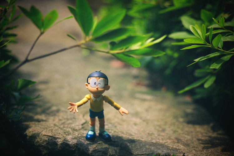 点击大图看下一张：机器猫与野比大雄