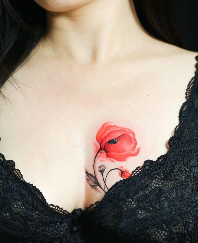 点击大图看下一张：水墨风格罂粟花纹身让人念念不忘