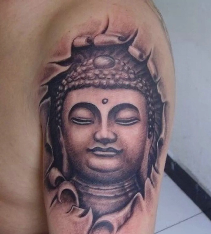 点击大图看下一张：大臂黑白如来佛祖纹身刺青