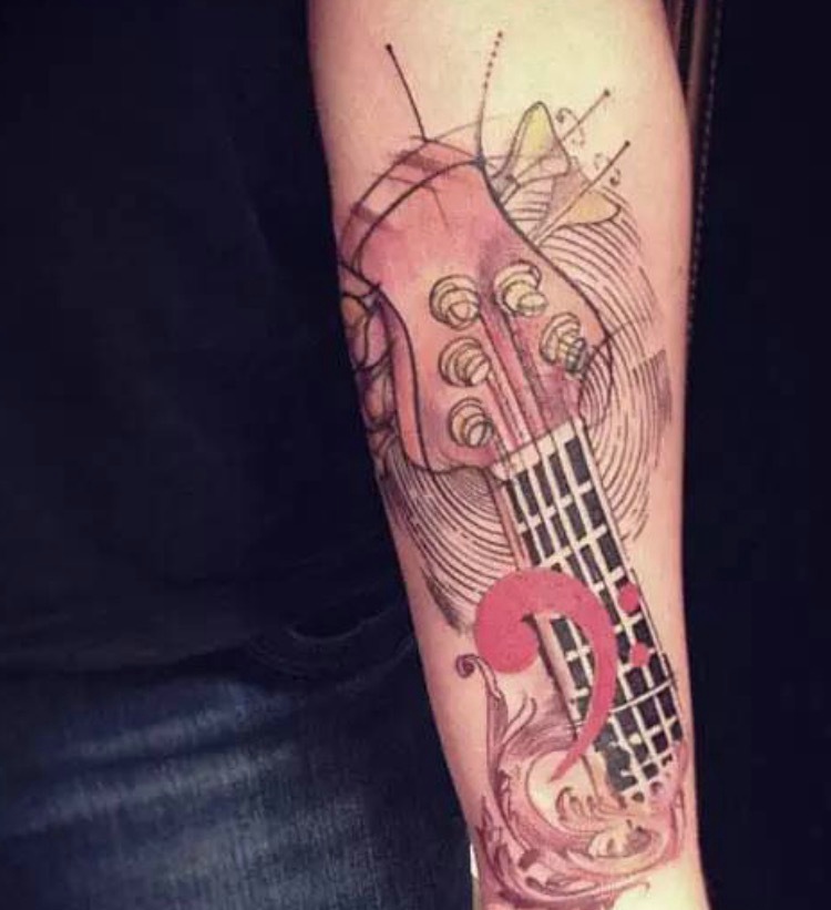 点击大图看下一张：热爱音乐的年轻人花臂吉他纹身图案