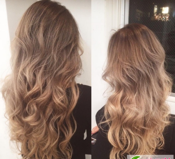 点击大图看下一张：性感轻熟女烫发卷发发型