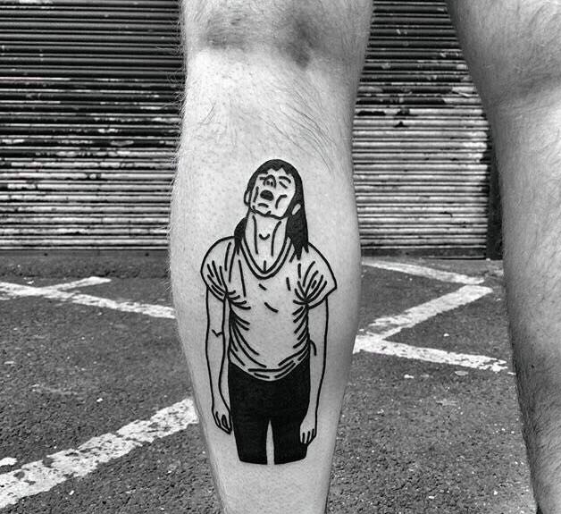点击大图看下一张：腿部一位已颓废的男士纹身图案