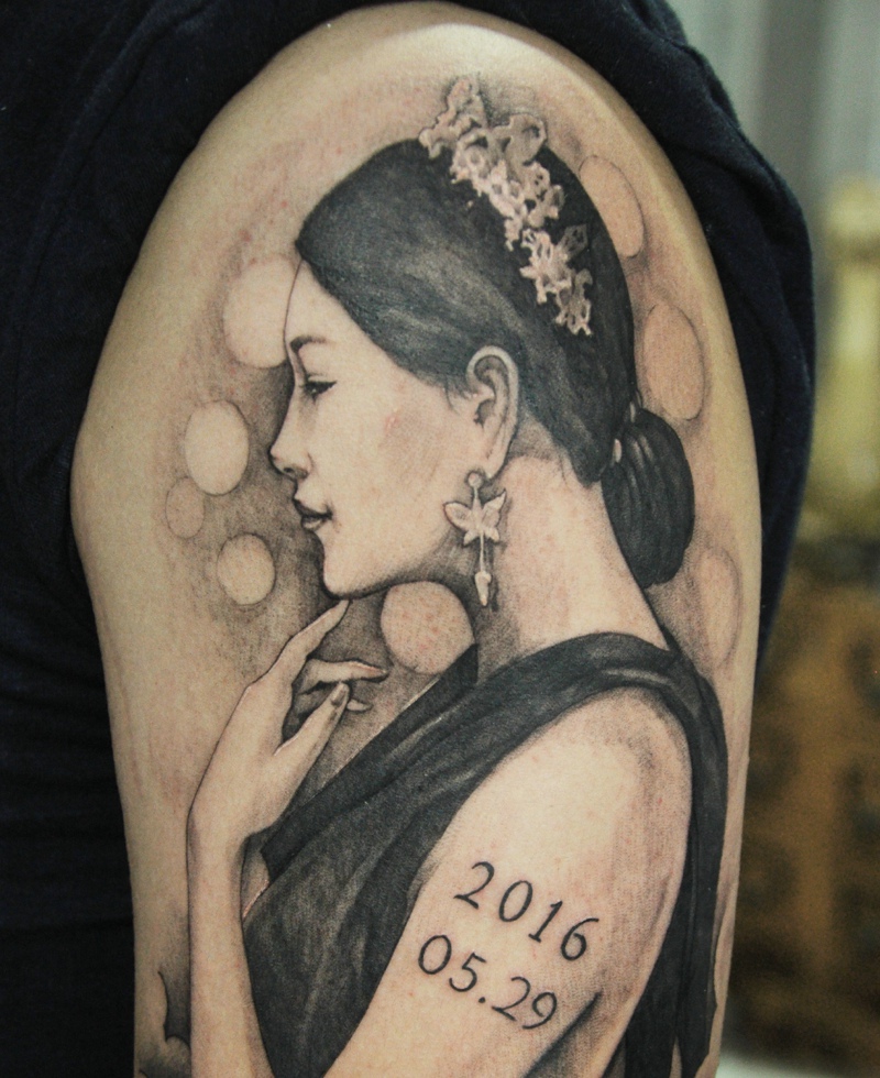 点击大图看下一张：爱她就把她纹在身上的手臂肖像纹身刺青