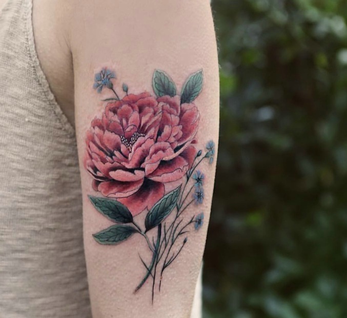 点击大图看下一张：一组彩色的花儿在皮肤上盛开纹身刺青