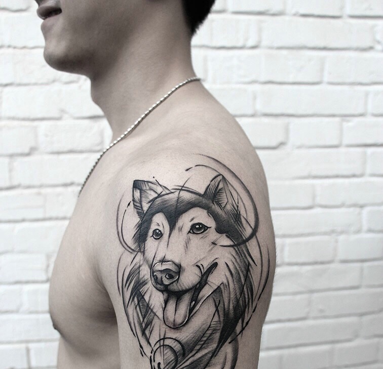 点击大图看下一张：手臂简单线条小狗纹身刺青