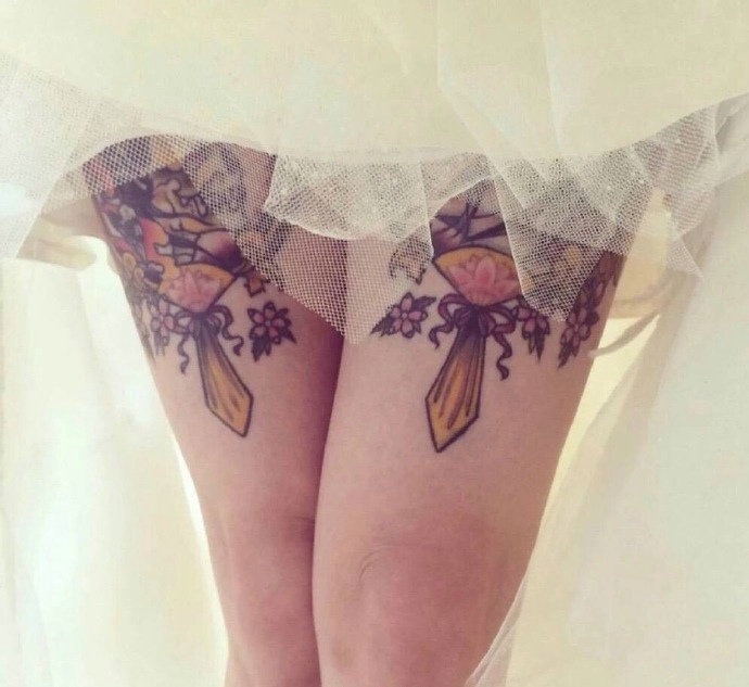 点击大图看下一张：花腿纹身刺青和婚纱更搭配