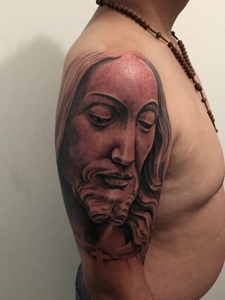 手臂个性威武的耶稣纹身图案
