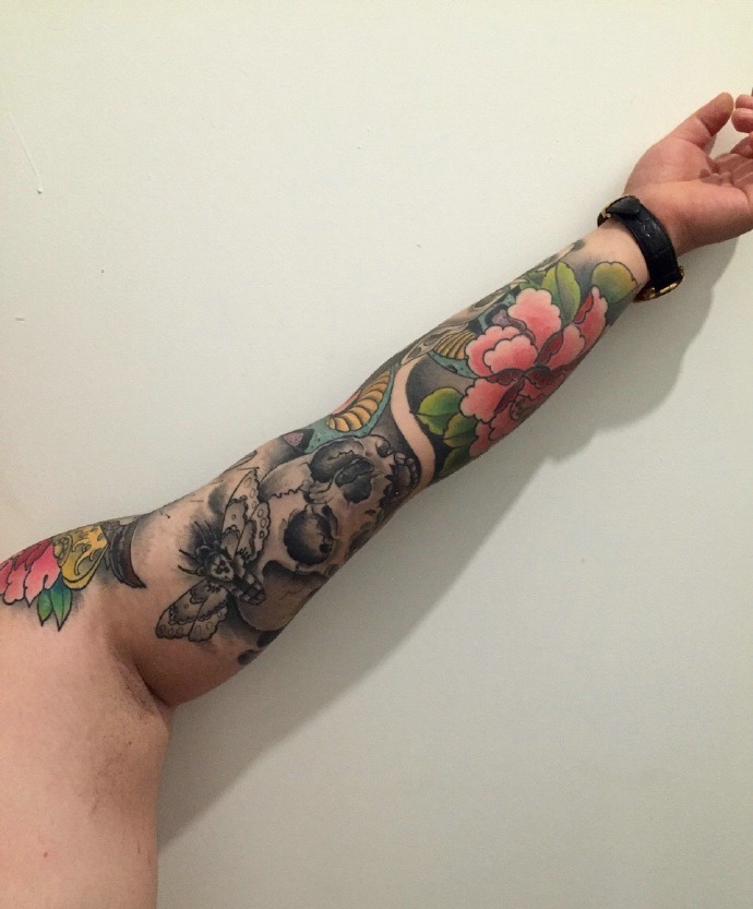 点击大图看下一张：耐看充实的花臂图腾纹身刺青