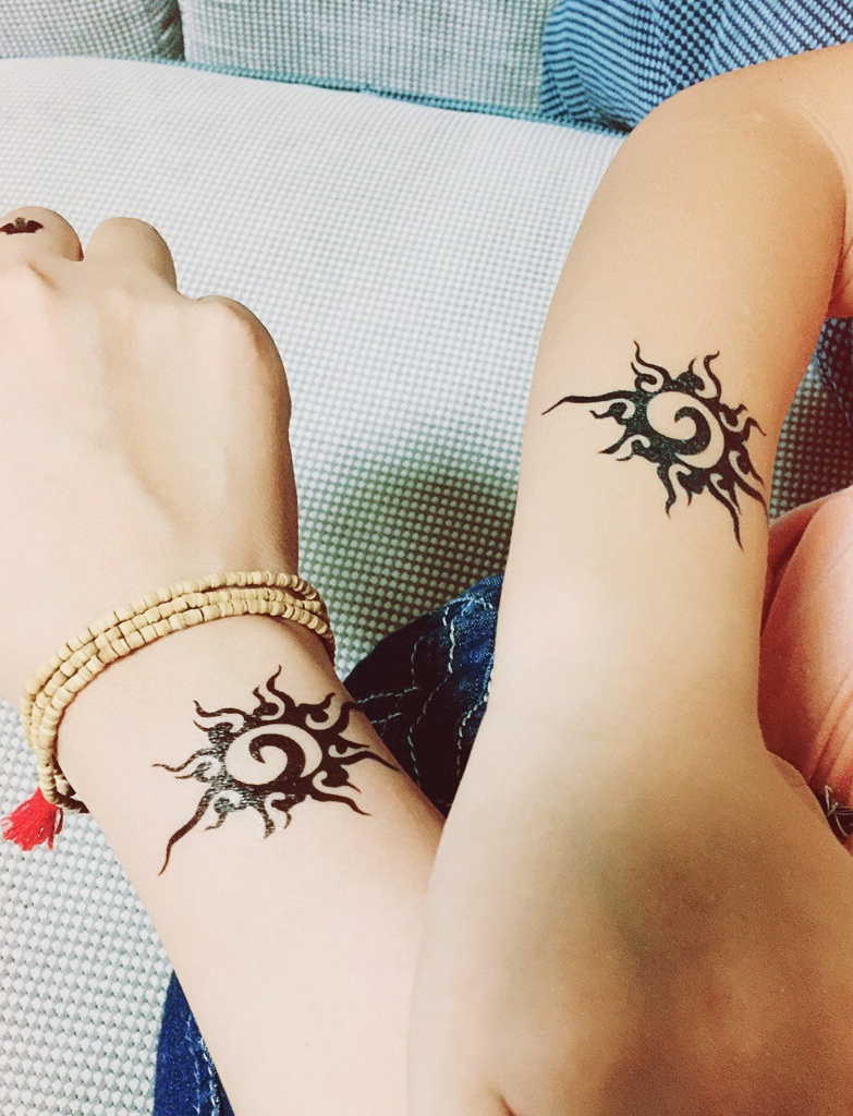 点击大图看下一张：清晰可贵的手臂个性情侣纹身图案