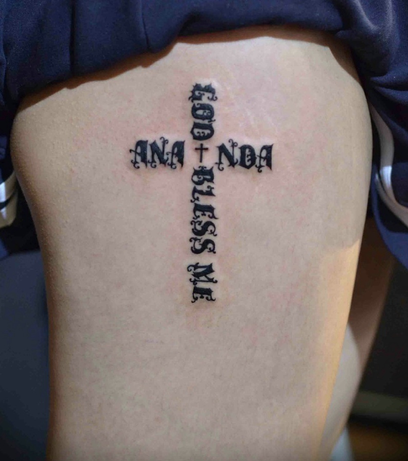 点击大图看下一张：个性独特的十字架英文单词纹身刺青